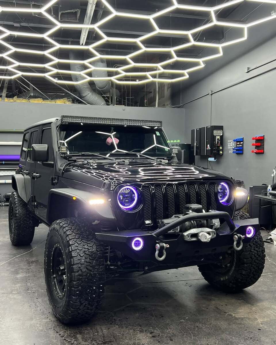 Clean Jeep with professional lighting effects after detailing